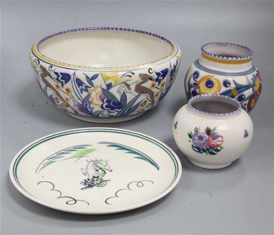 A large Poole bowl, plate and two pots